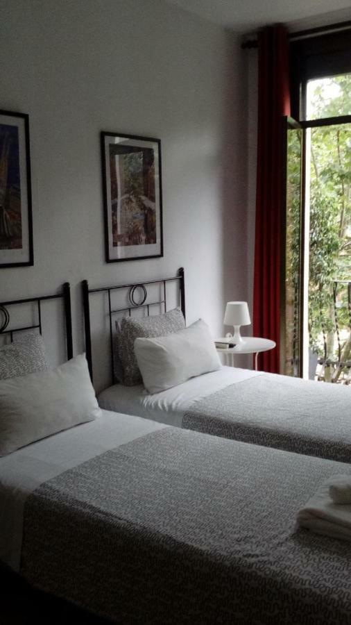 Tweepersoonskamer met 1 of 2 Bedden en Gedeelde Badkamer